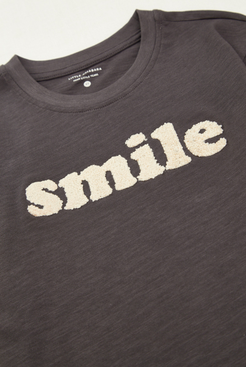 REMERA SMILE